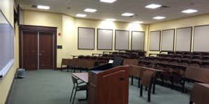 Shannon school of business lecture hall with stepped sitting of benches and projector and whiteboards