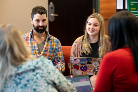 Group of students talking with each other